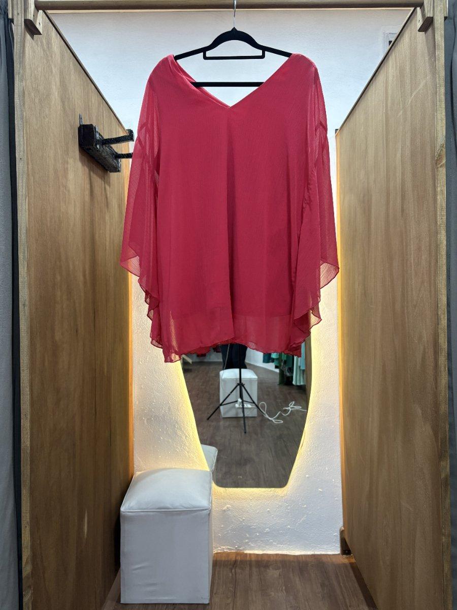 Vestido rosado estilo poncho
