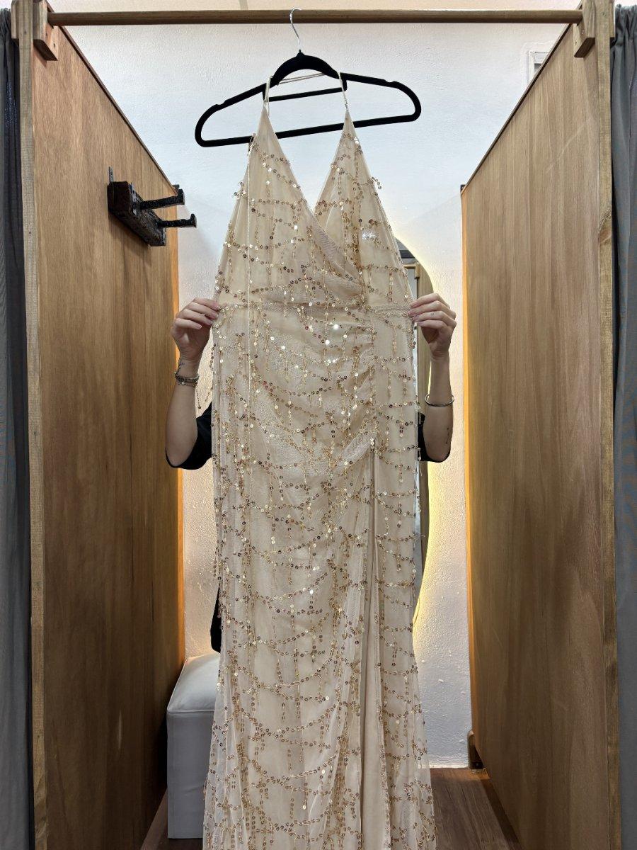 Vestido largo beige con lentejuelas